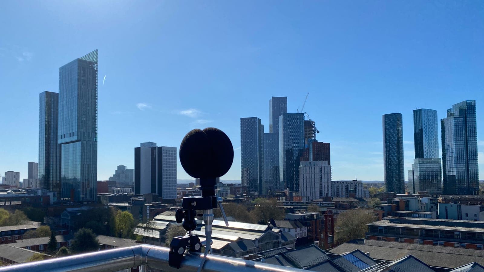 A Class 1 sound level meter monitoring on a city-centre rooftop